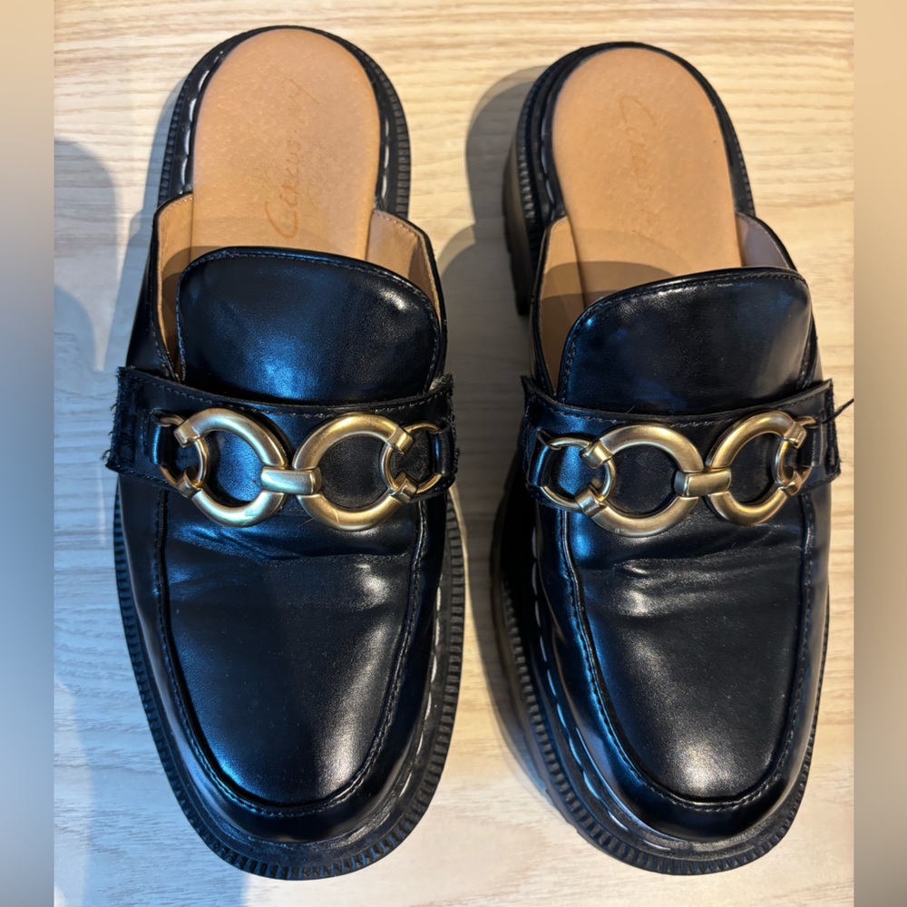 Elegant Black Leather Loafers with Gold Accents